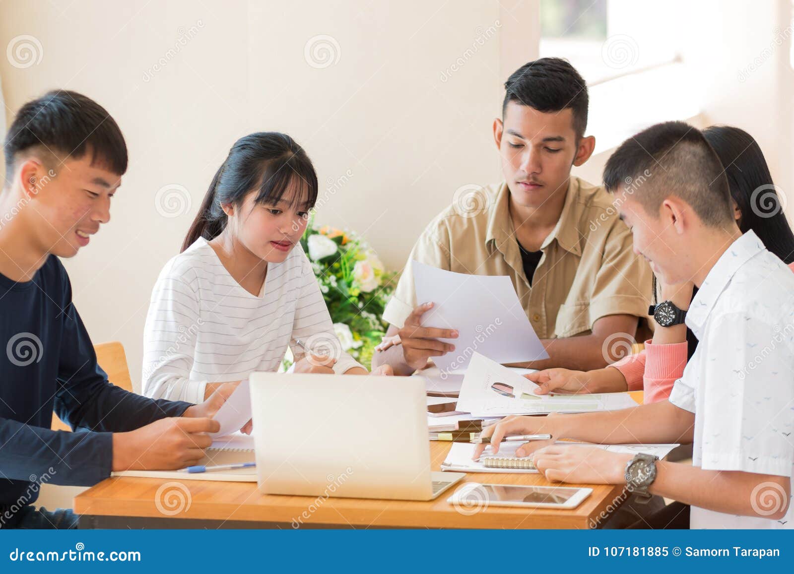 asian college groups of students using laptop, tablet, studying