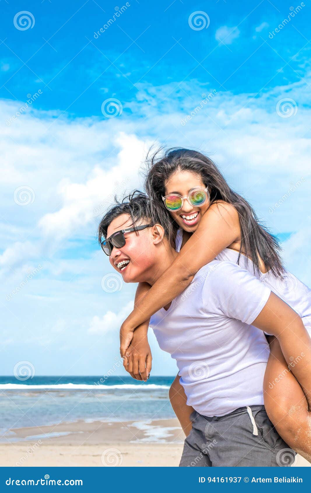 Asian Couple Having Fun On The Beach Of Tropical Bali Island Indonesia Stock Image Image Of