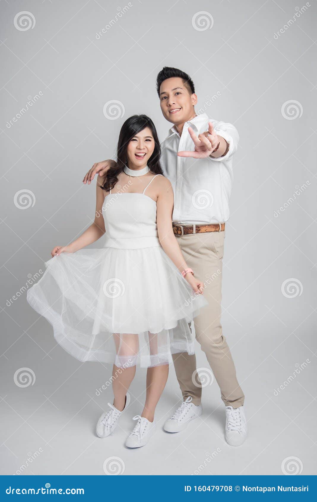 Asian Couple in Love in Casual Wedding Dress Showing I Love You Gesture  Stock Photo - Image of bride, joyful: 160479708