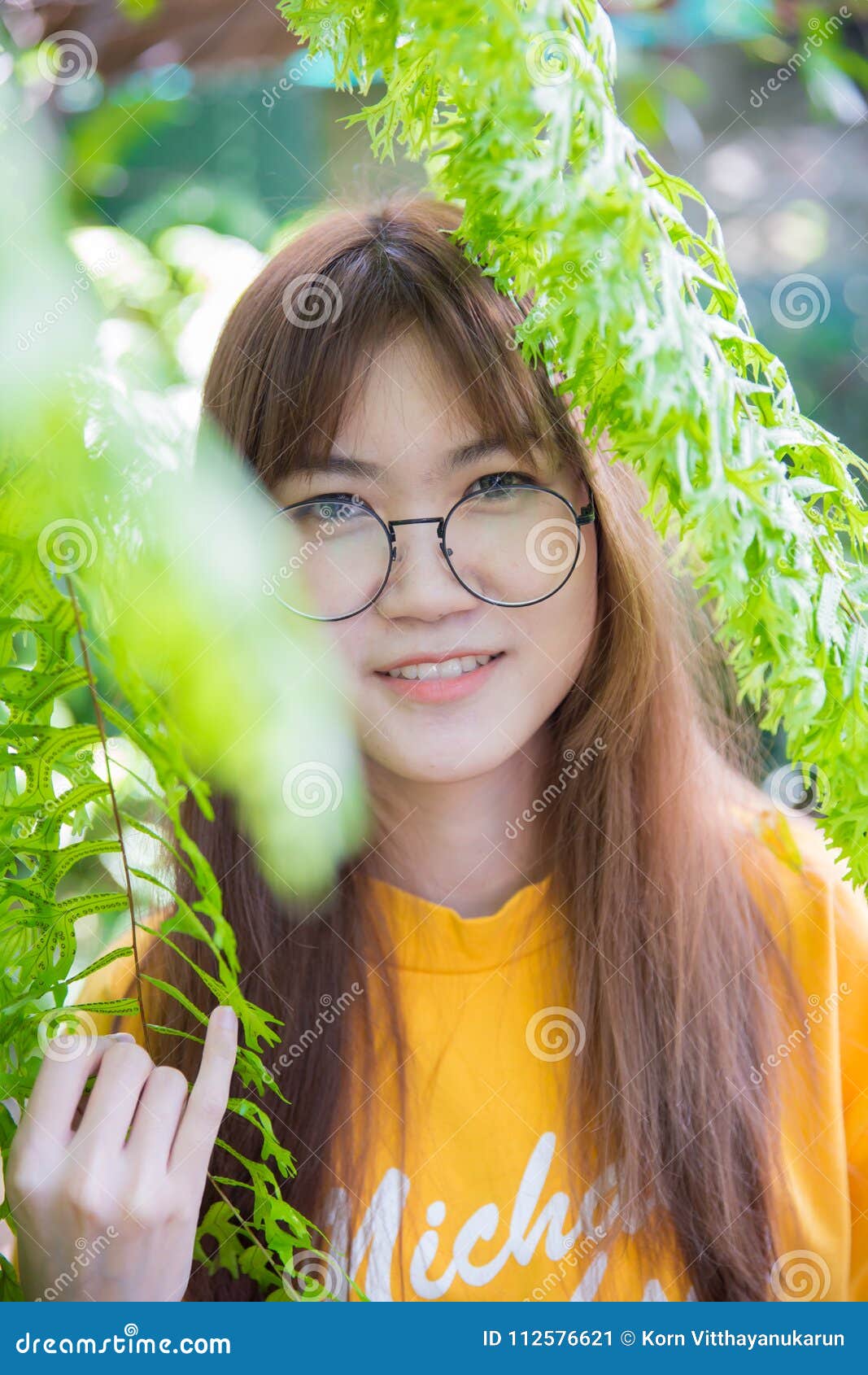 Asian Teen With Glasses