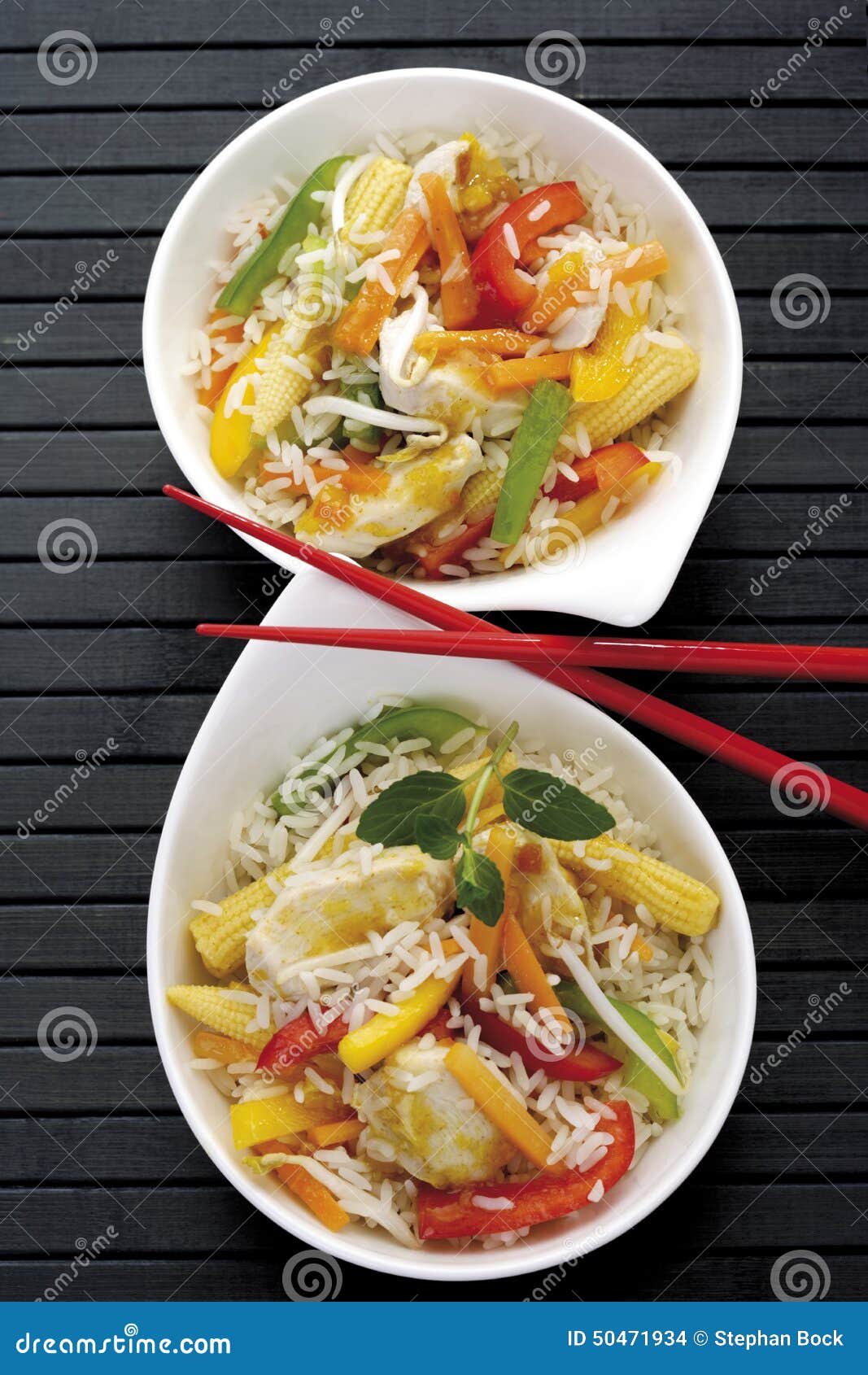 Asian Dish with Chicken, Different Vegetables and Rice Stock Photo