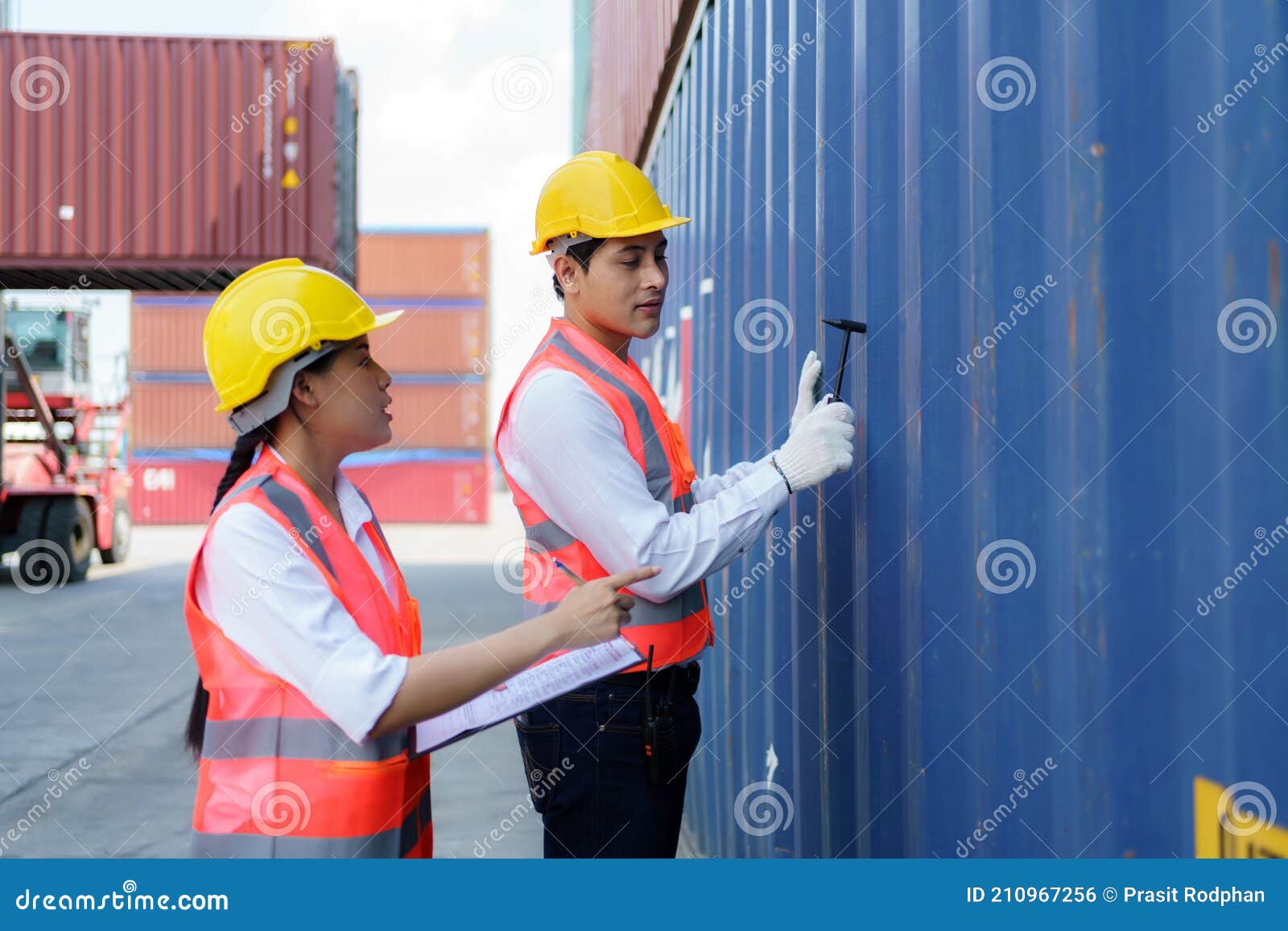 Asian Engineer or Foreman Using Chipping Hammer Tool for Checking the