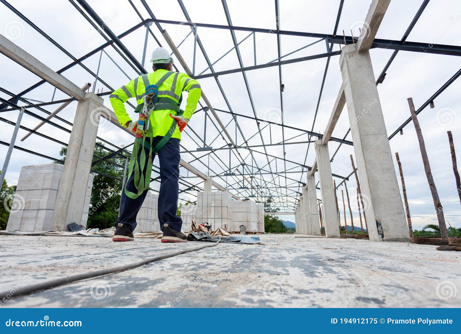 Asian Engineer Technician Watching Construction Control in the