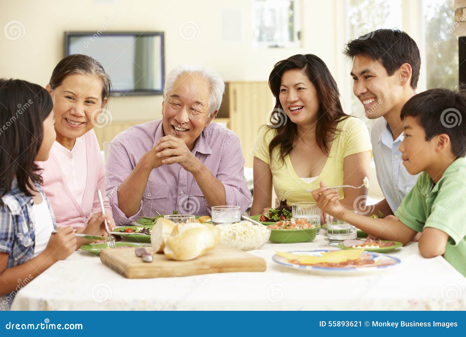 asian family sharing meal at home