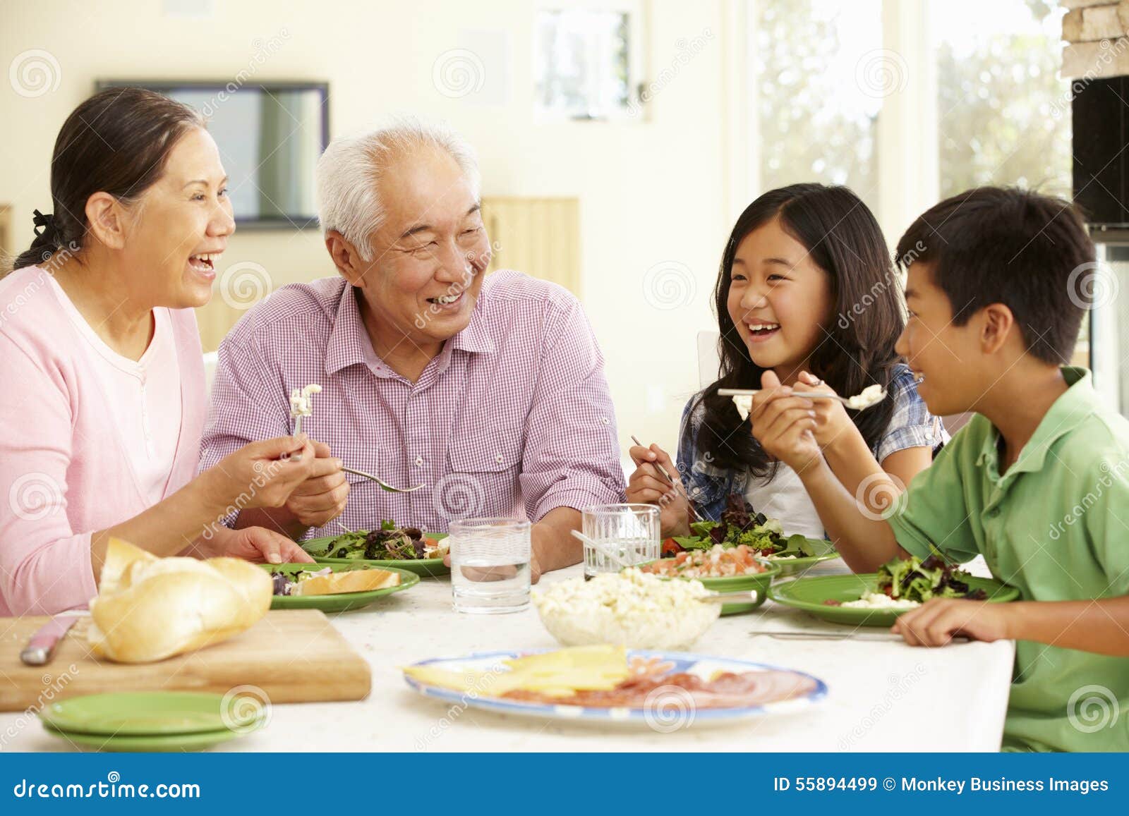 Asian Family Sharing Meal at Home Stock Image Image of food, casual