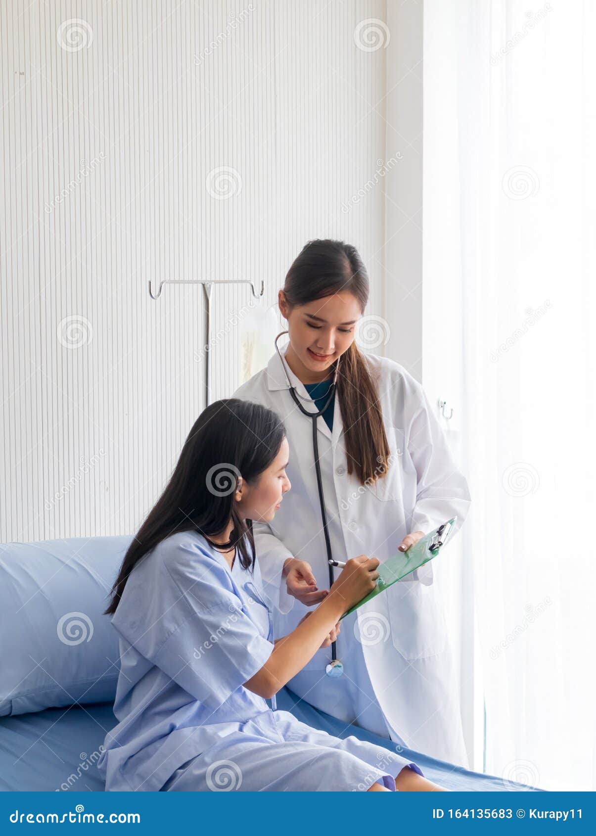 Asian Female Doctor Examined The Patient On A Bed In The Room Stock Image Image Of Lifestyle