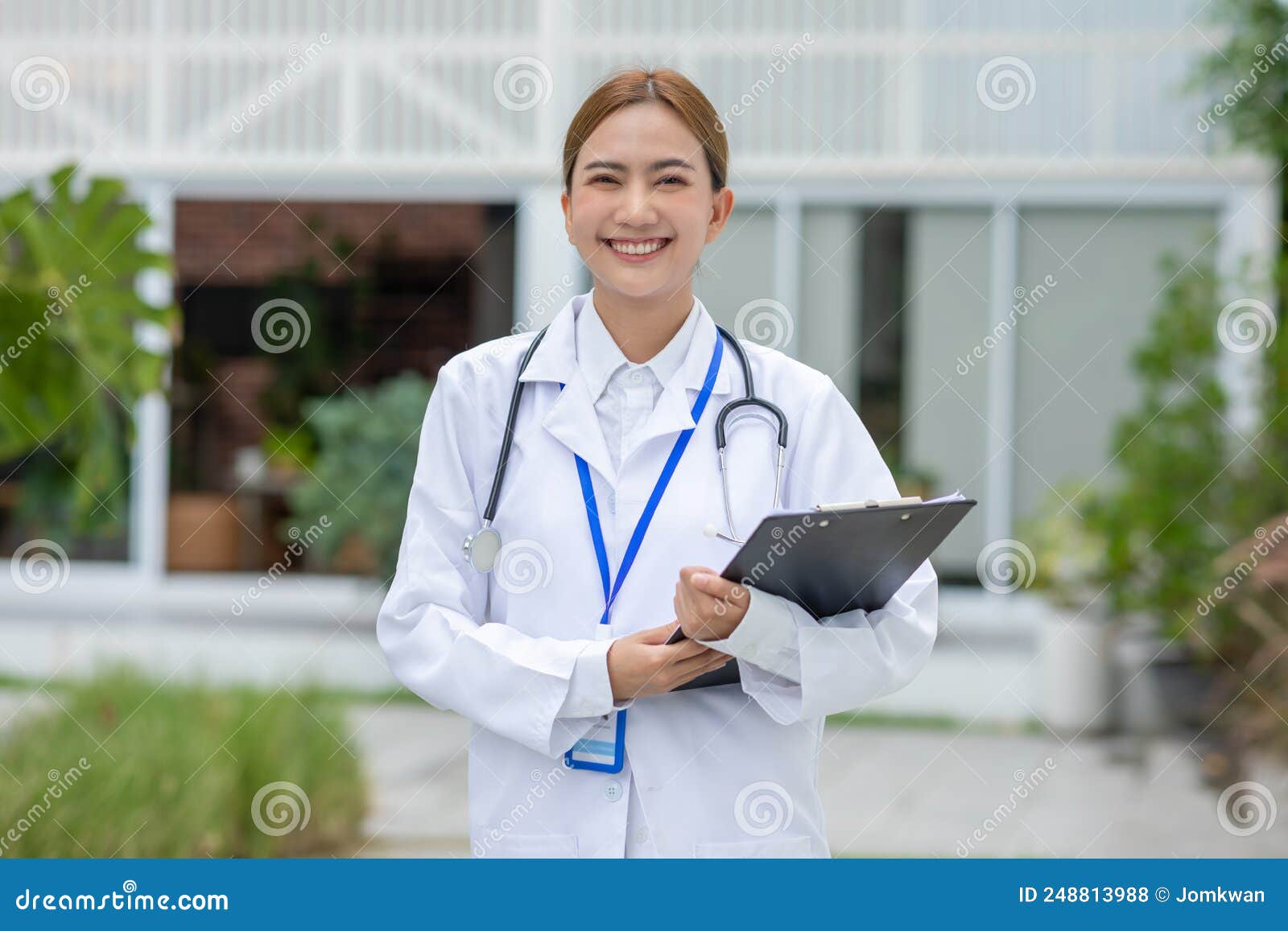 Asian Female Doctor with a Stethoscope Smile Looking at Camera. Doctor ...