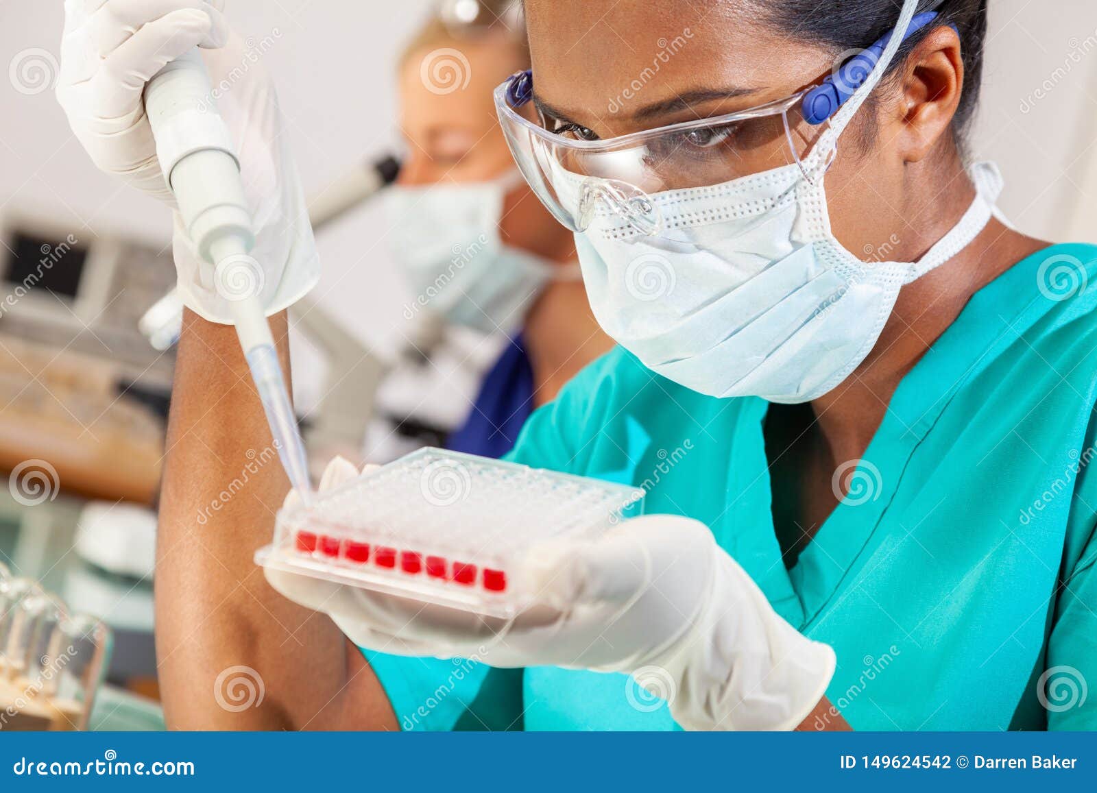 asian female scientist blood test medical research lab