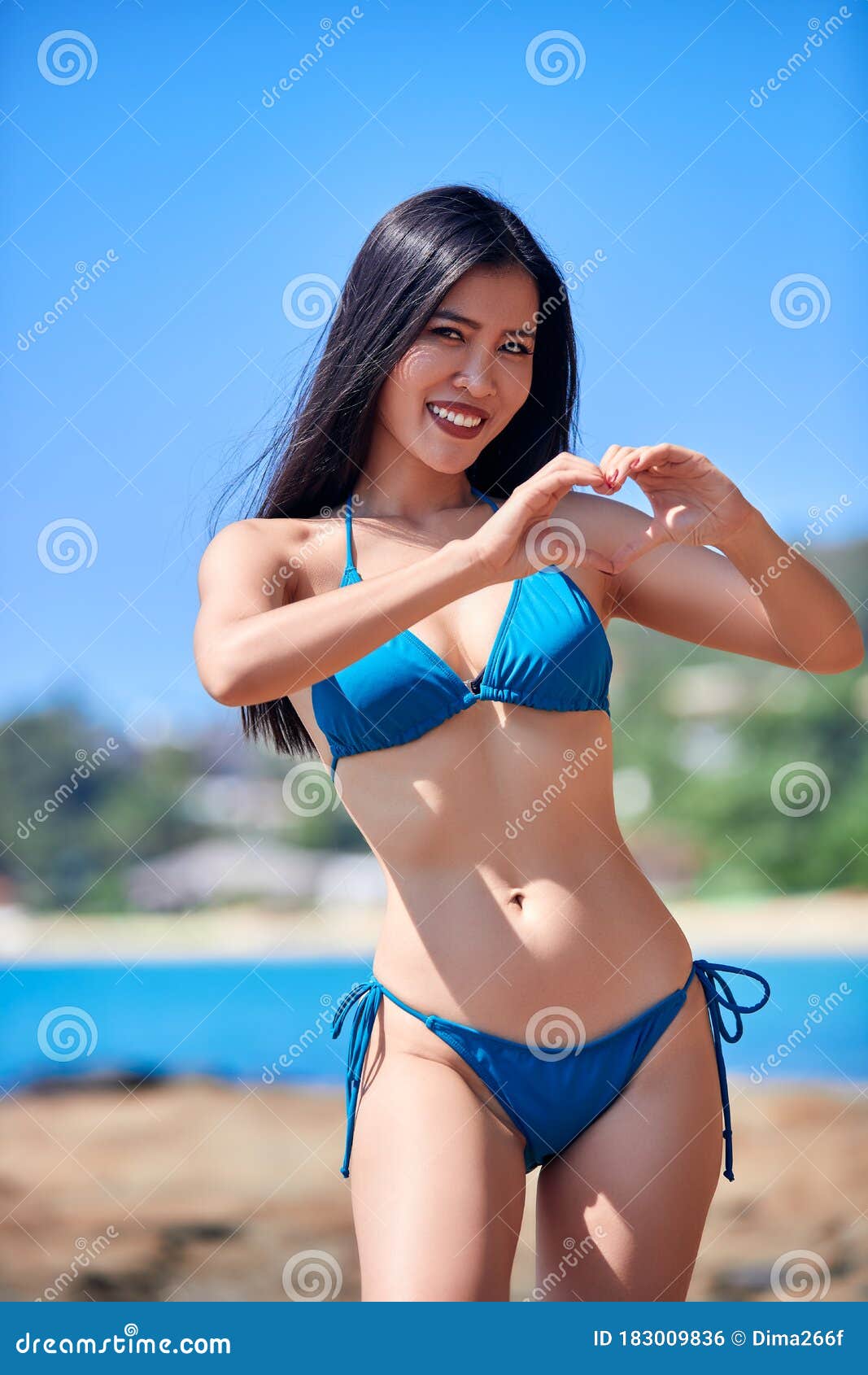 Sympathiek Premisse Tahiti Asian Girl in a Blue Bikini Showing Heart - Love`s Symbol and Smile on the  Beach Stock Photo - Image of beautiful, lagoon: 183009836