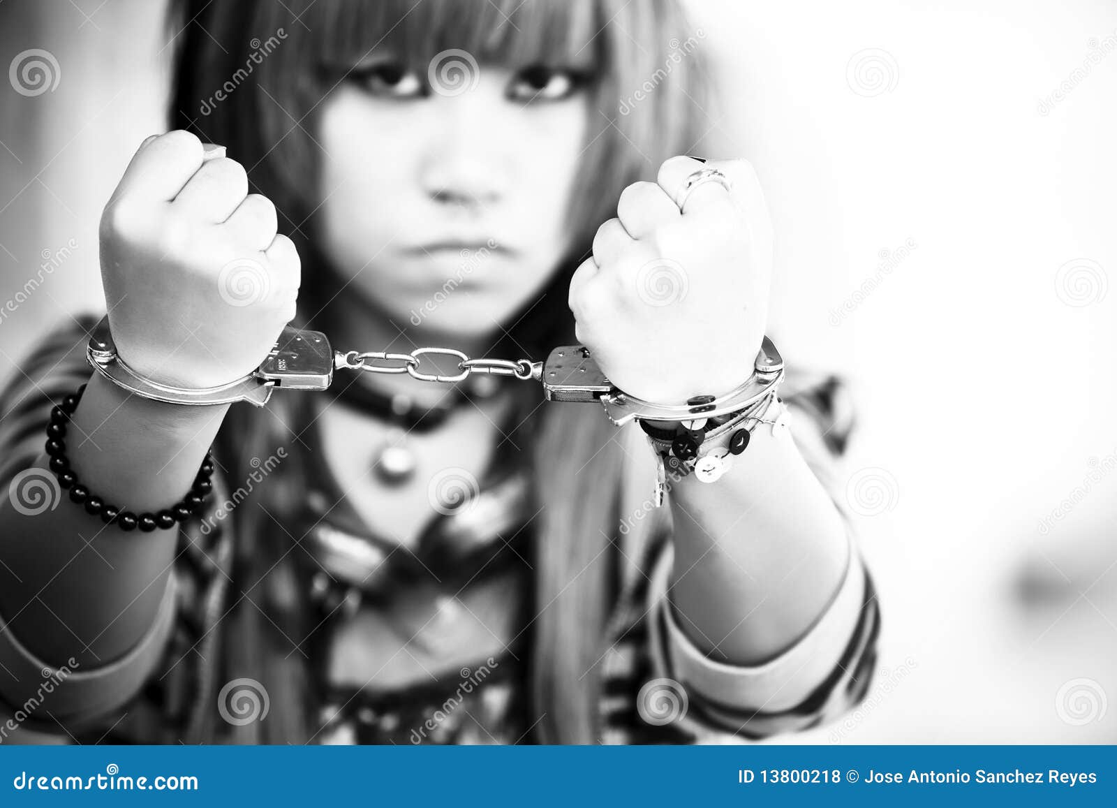 Asian girl with handcuffs stock photo. Image of anime 13800218