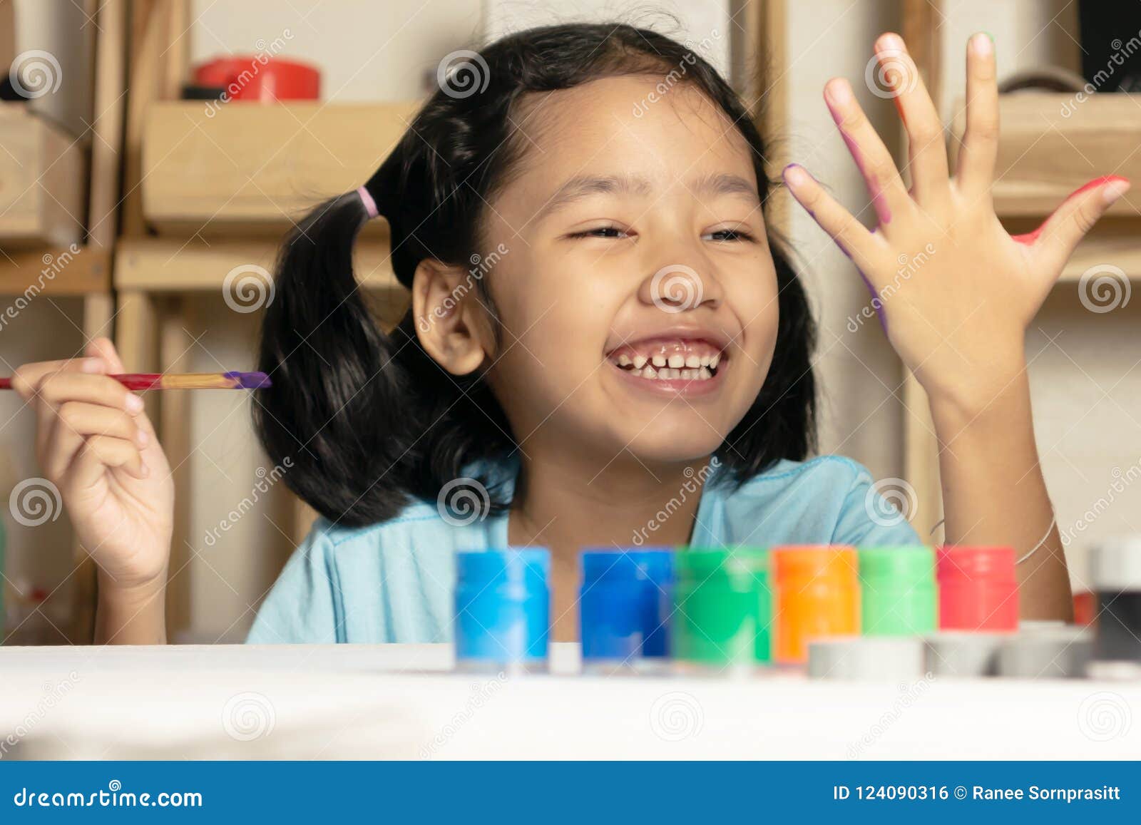 Asian Girl is Painting Color on Finger Stock Photo Image of color