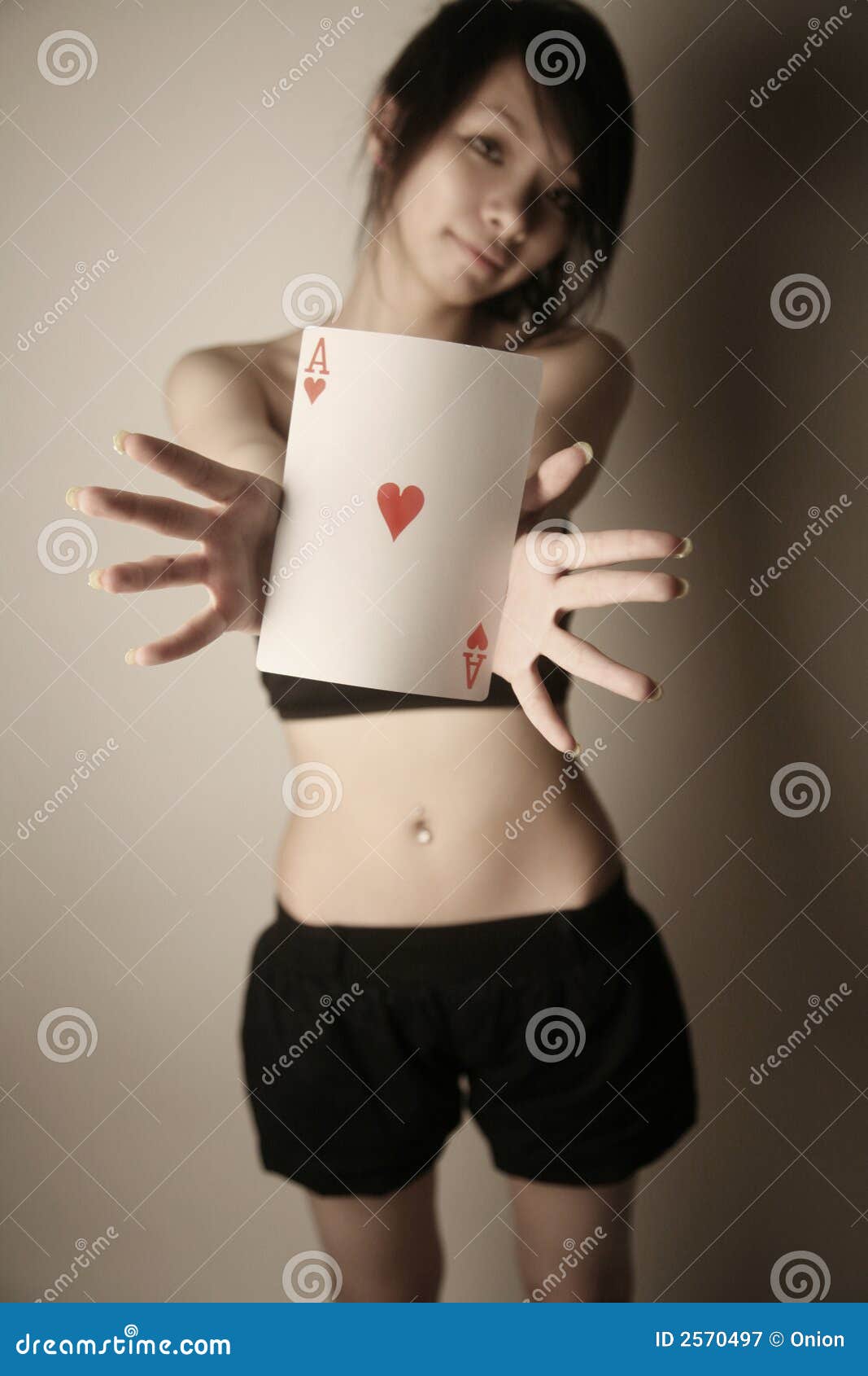 Asian Girl With Playing Card Royalty Free Stock Asian Girl With Playing Card Royalty Free Stock