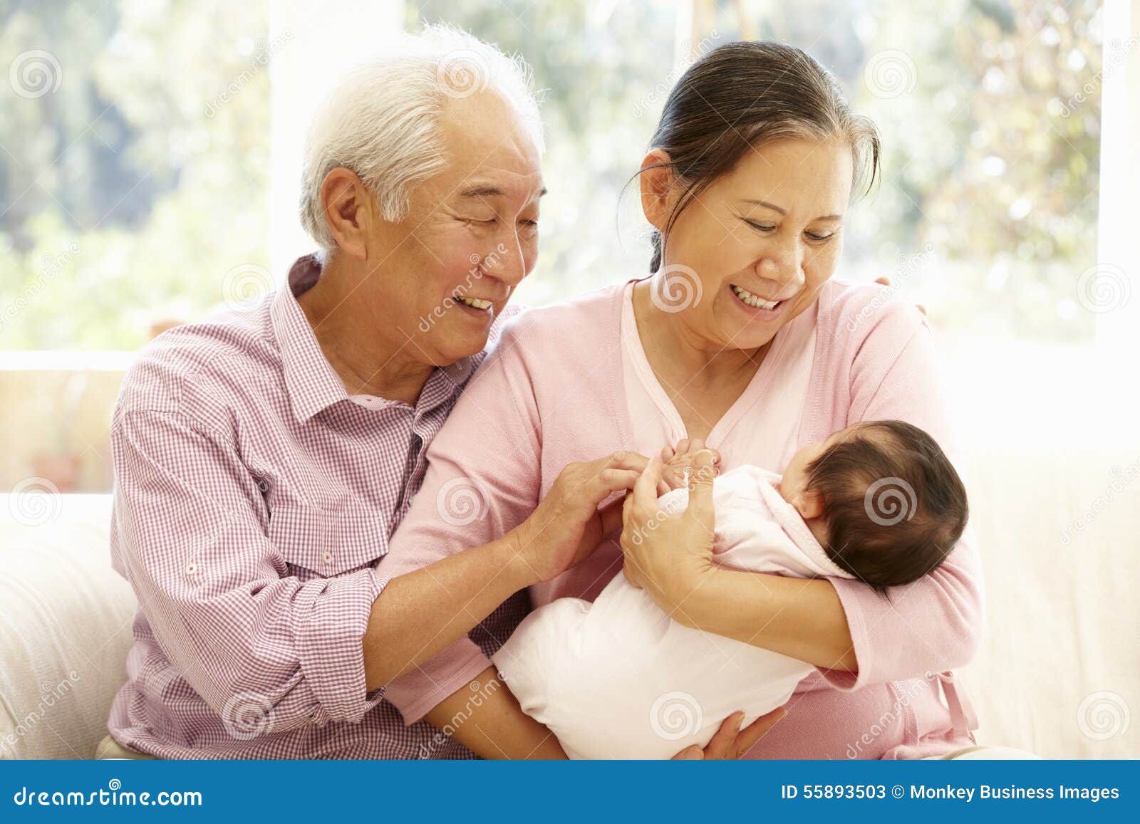 Asian Grandparents Selfie With Granddaughter At Home. Senior Chinese
