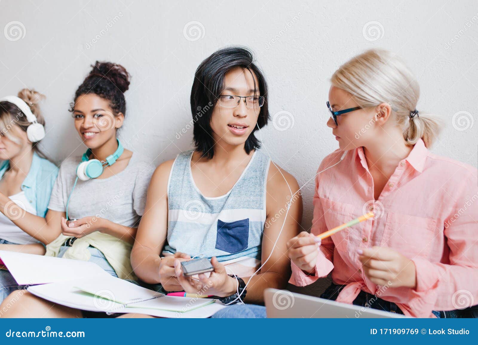 Asian Guy with Long Hair Discussing about New Song with Blonde Female Friend in Glasses while Black Girl Smiling on Stock Image - Image of female, chinese: 171909769 Asian Guy with Long Hair Discussing about New Song with Blonde Female Friend in Glasses while Black Girl Smiling on Stock Image - Image of female, chinese: 171909769