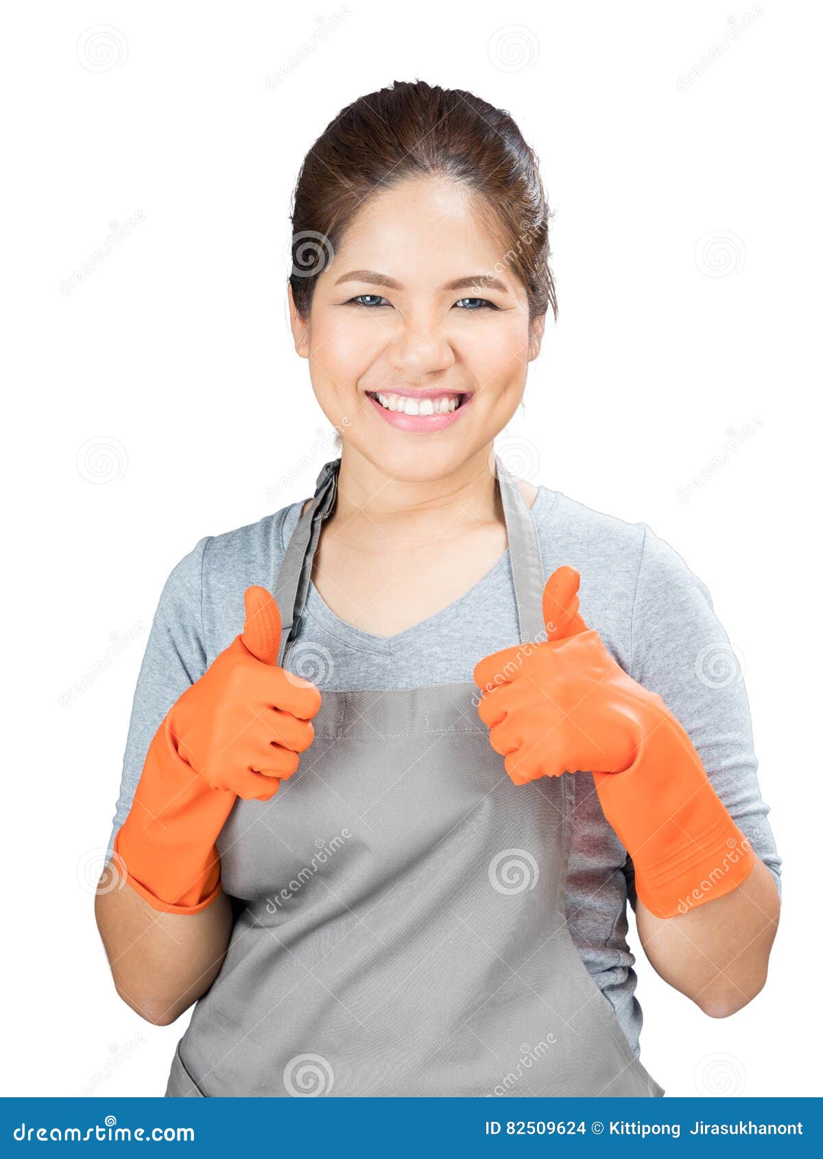 Asian housewife thumbs up stoc photo