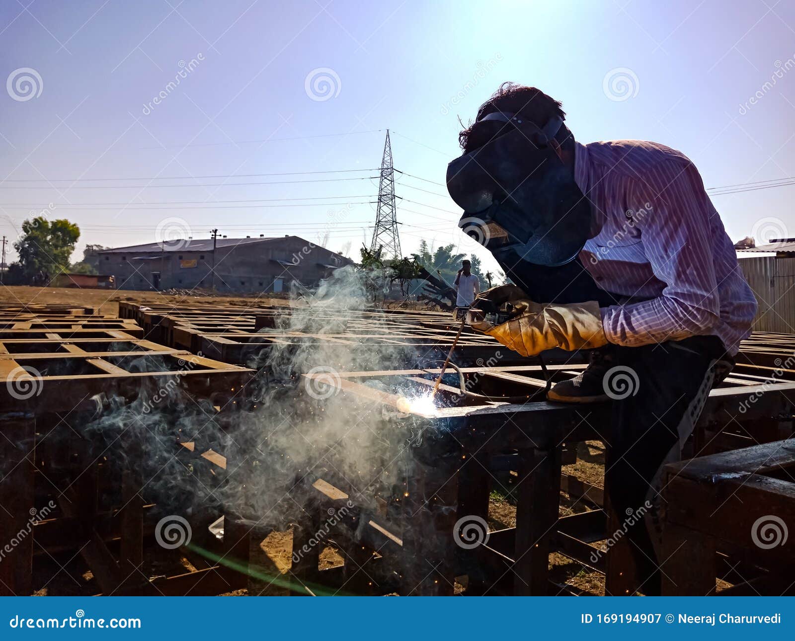 An Asian Labour Welding on Iron Structure during Indian Railway Bridge