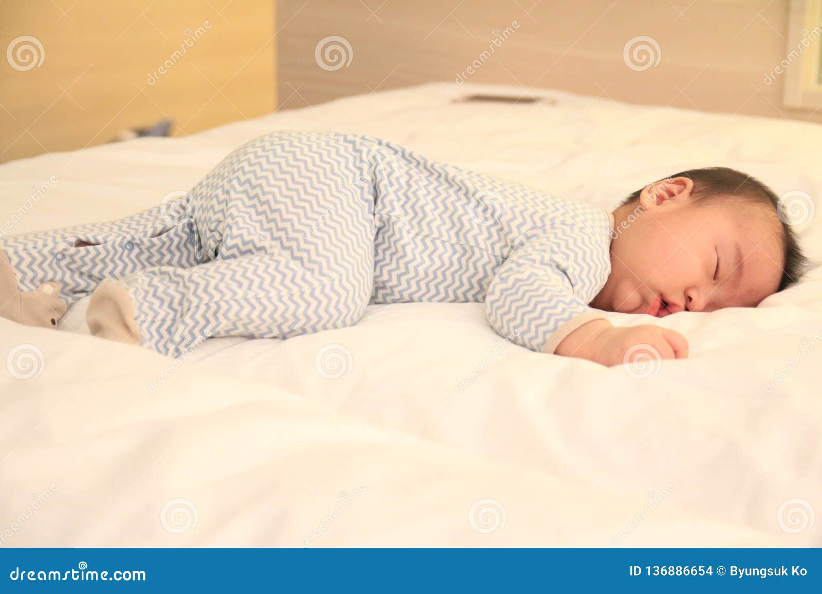 Asian Little Baby Falling Asleep on the Bed Stock Photo Image of care