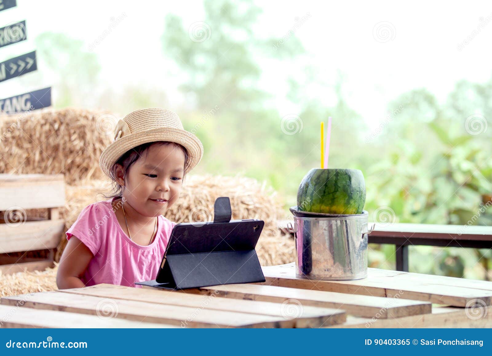 Asian Little Girl Is Playing Ipad Tablet Stock Image 