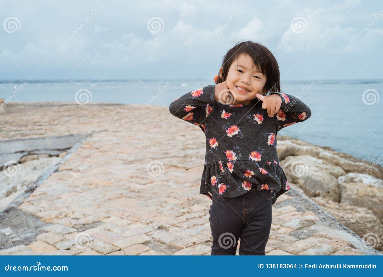 Asian Little Girl Pose with Cute Face Smile when Look at the Camera on ...