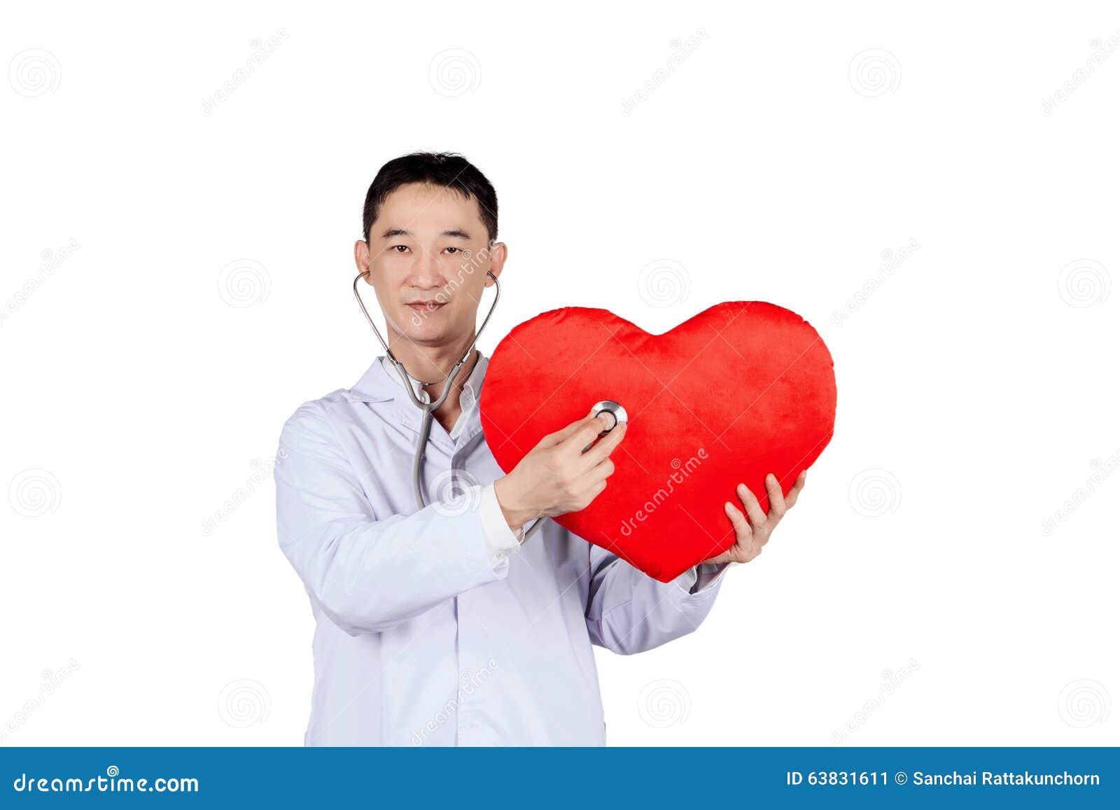 asian male doctor auscultation a red heart with a stethoscope,