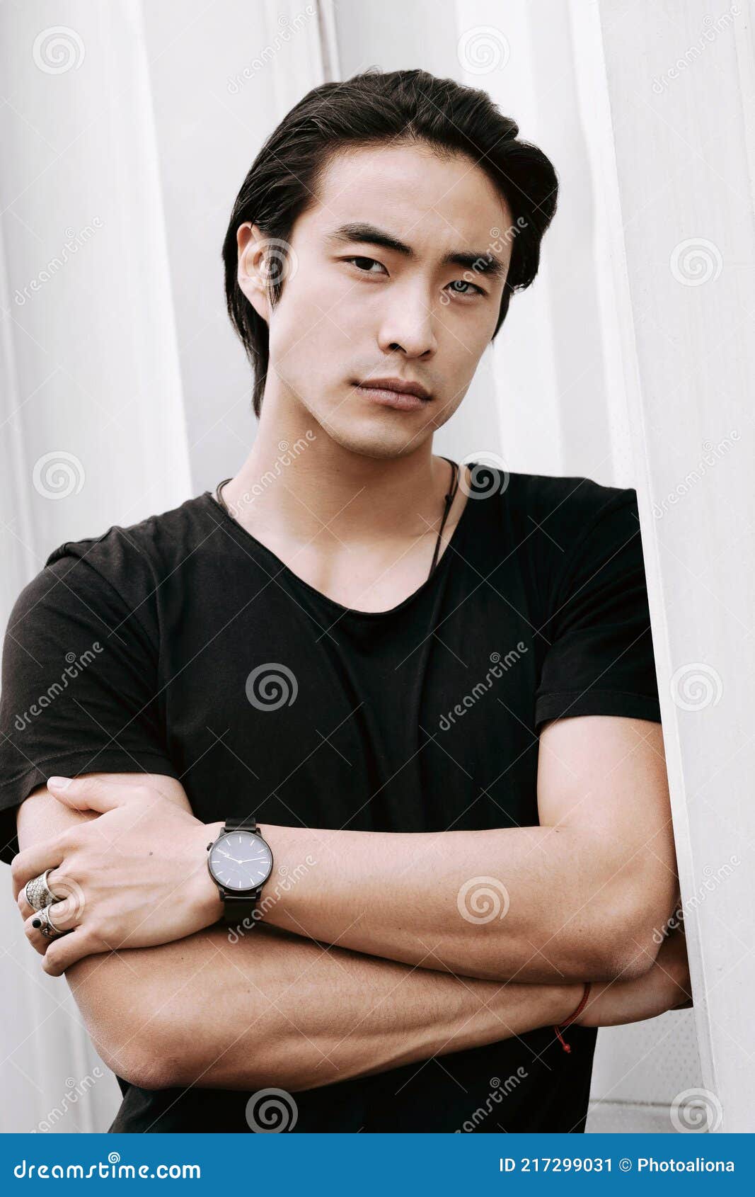 Asian Male Model Posing Arms Crossed, Long Dark Haircut, Wearing Black ...