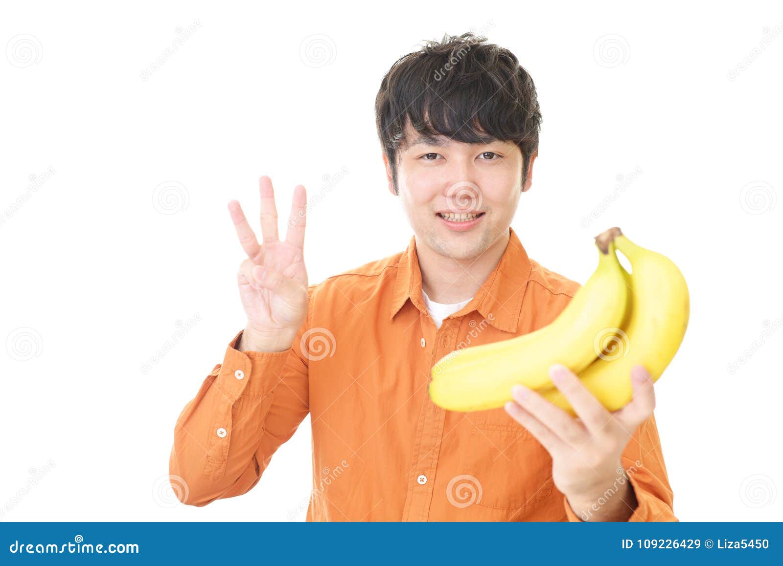 Asian man with bananas stock image. Image of human, beauty 109226429