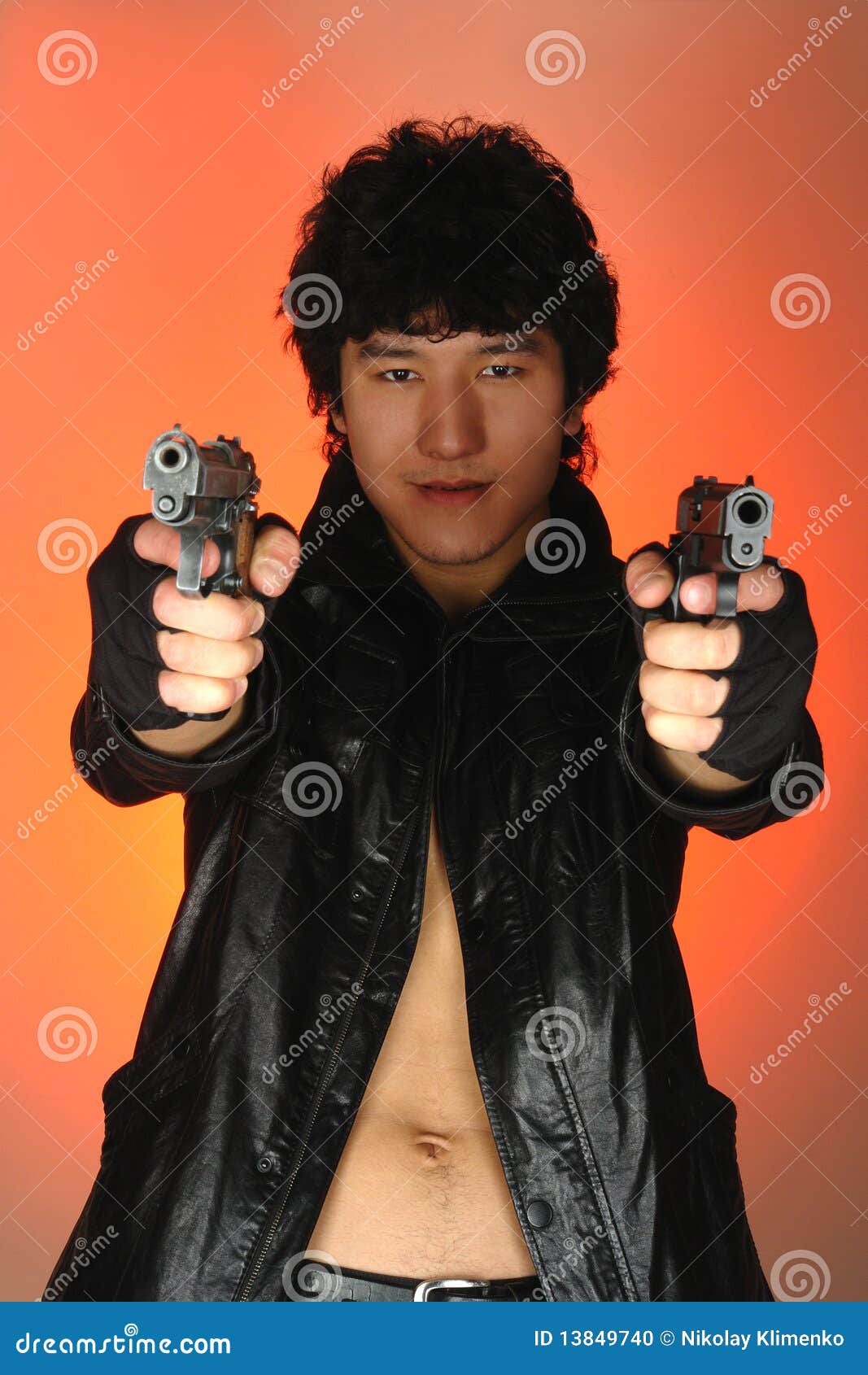 Asian Man With Guns Stock Photo - Image: 13849740