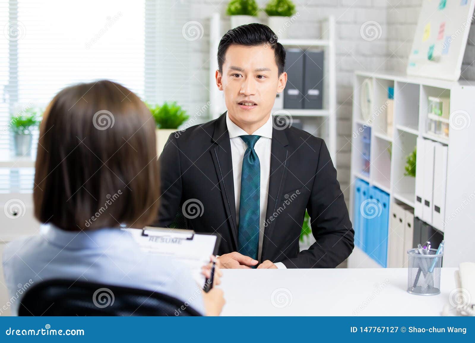 asian man in job interview