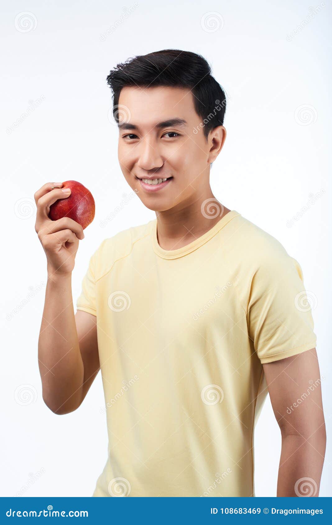 Asian Man with Red Apple stock image. Image of smiling - 108683469