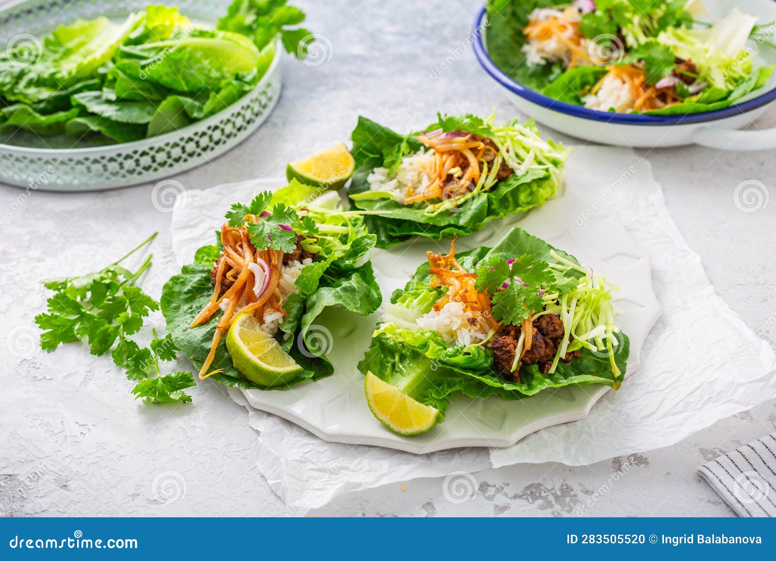 Asian Minced Meat Lettuce Wraps with Rice, Bean Sprouts and Cabbage
