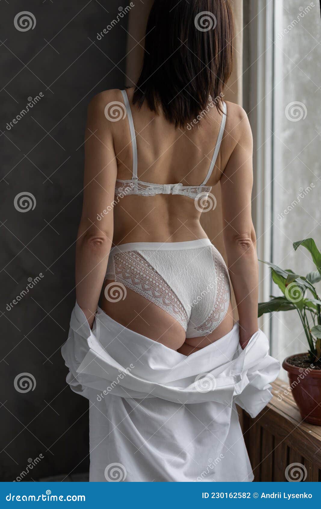 Asian Model Woman in White Bra Lingerie and Panties on a Beautiful Female  Ass. Morning Bride in the Bedroom Girl Posing Stock Photo - Image of body,  female: 230162582