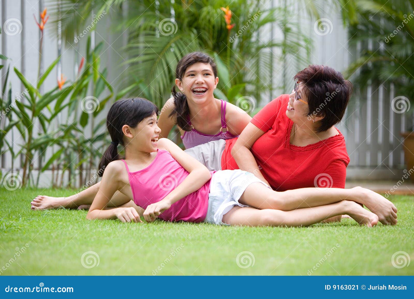 Asian Mom Having Fun With Her Girls Stock Image Image 9163021