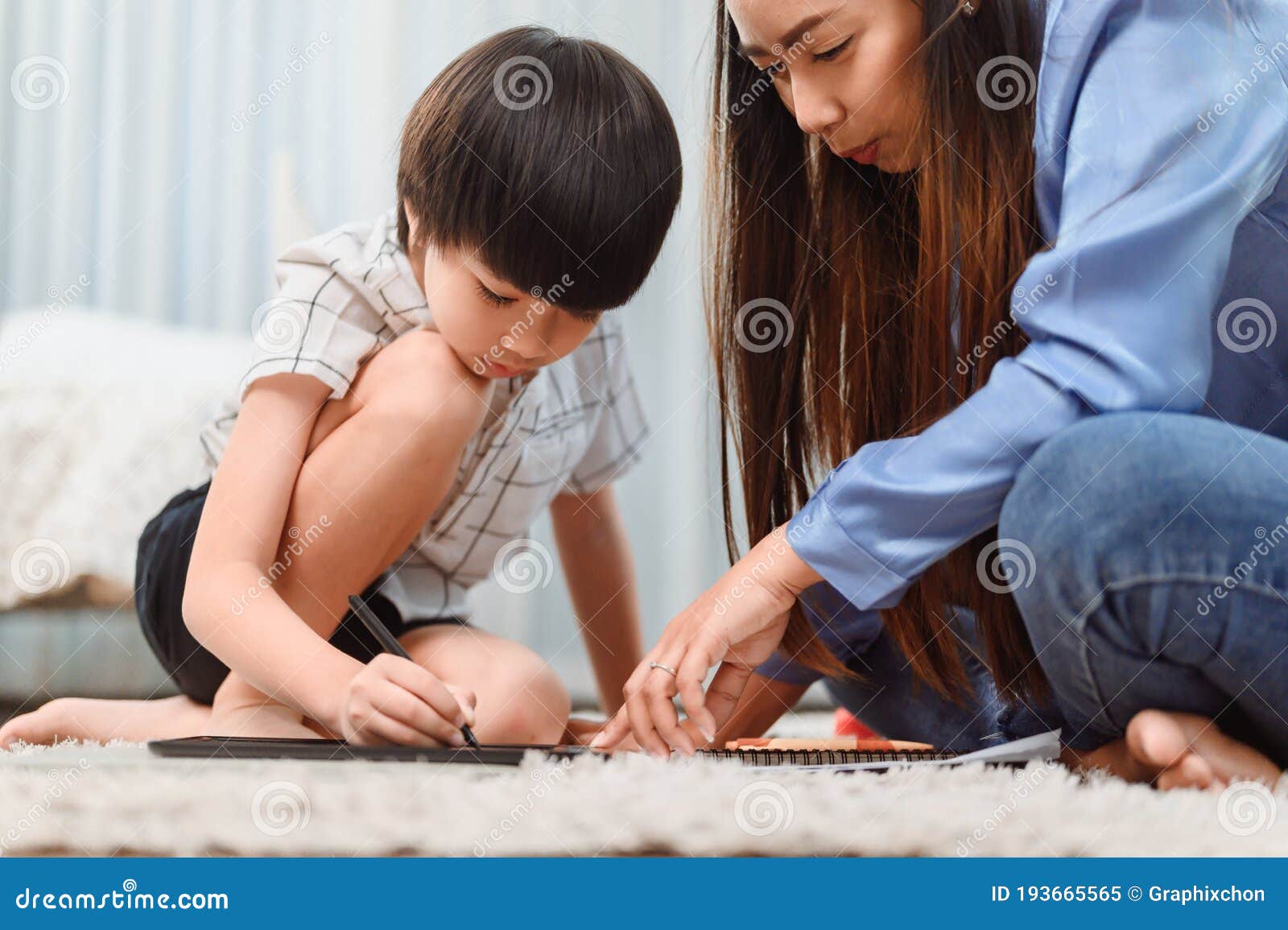 Asian Mother Work Home Together With Son Mom Teaching Kid For Onli