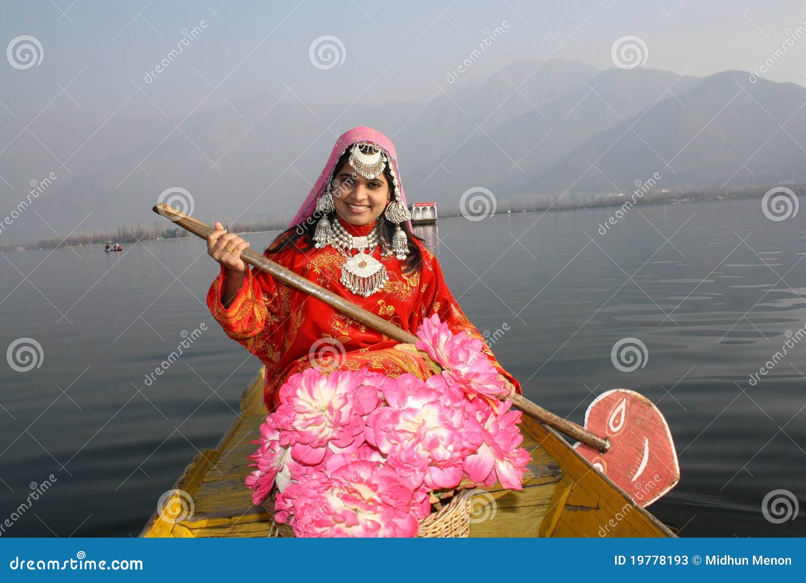 Asian Native Girl Rowing A Boat Stock Image - Image: 19778193