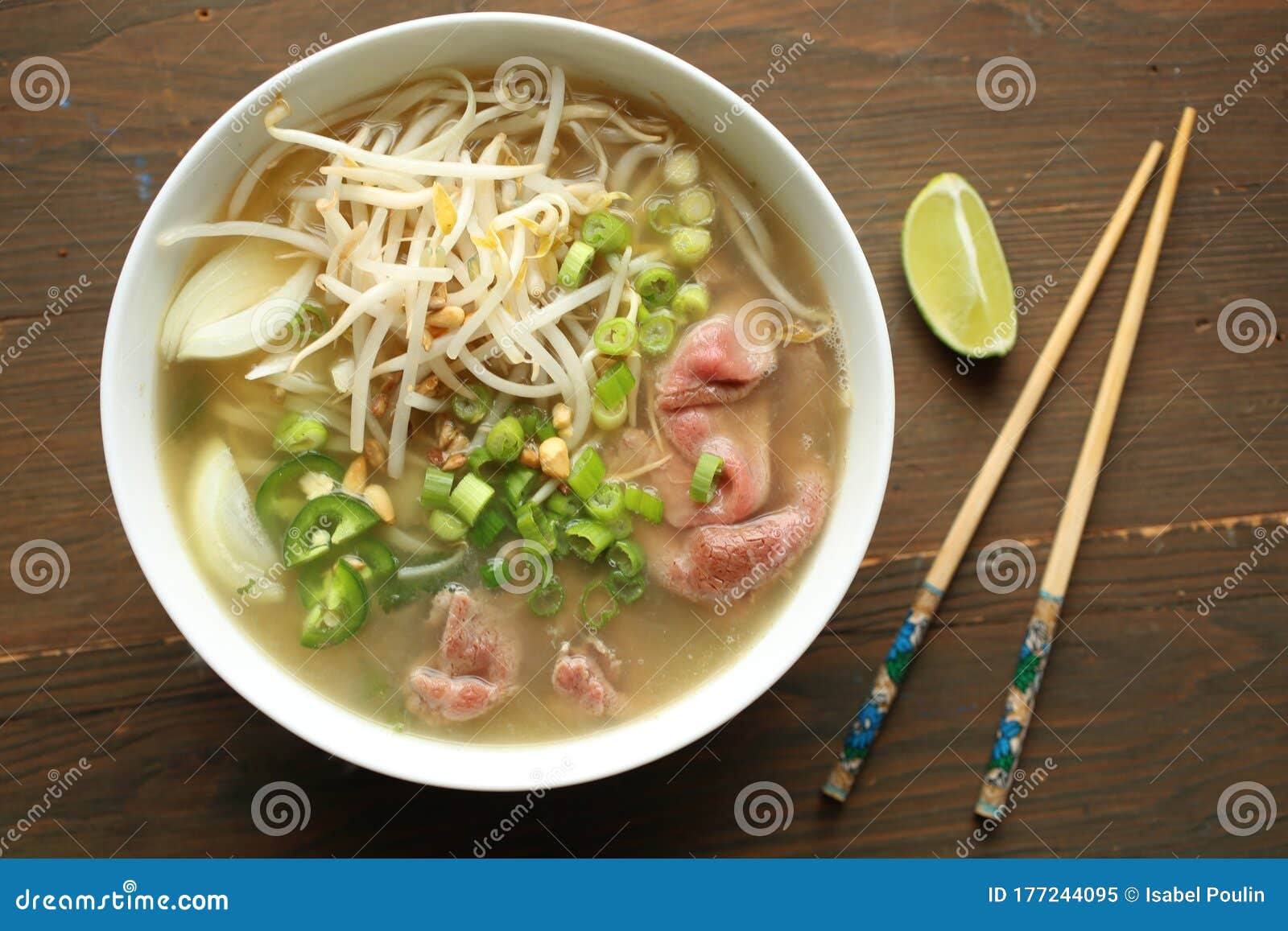 ramen soup with noodle with meat, fresh herbs and vegetables