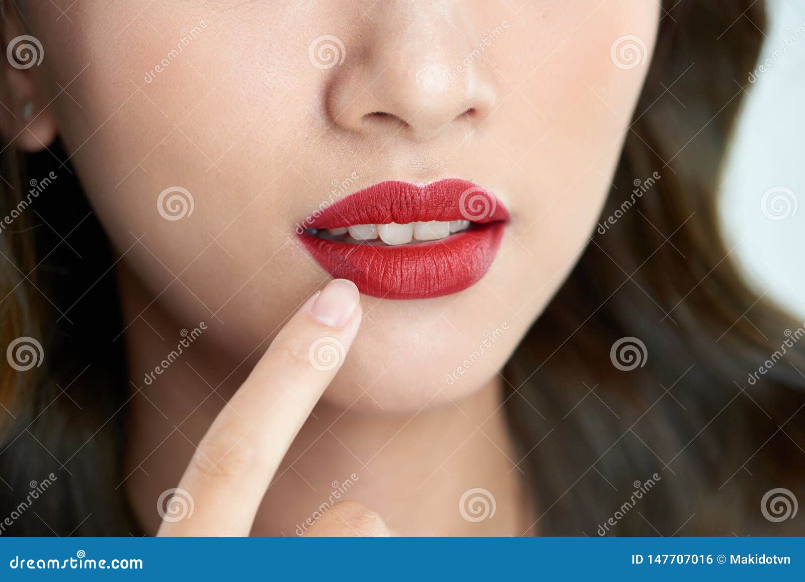 Asian with Open Mouth Touching Lips Stock Photo Image of face, colorful 147707016
