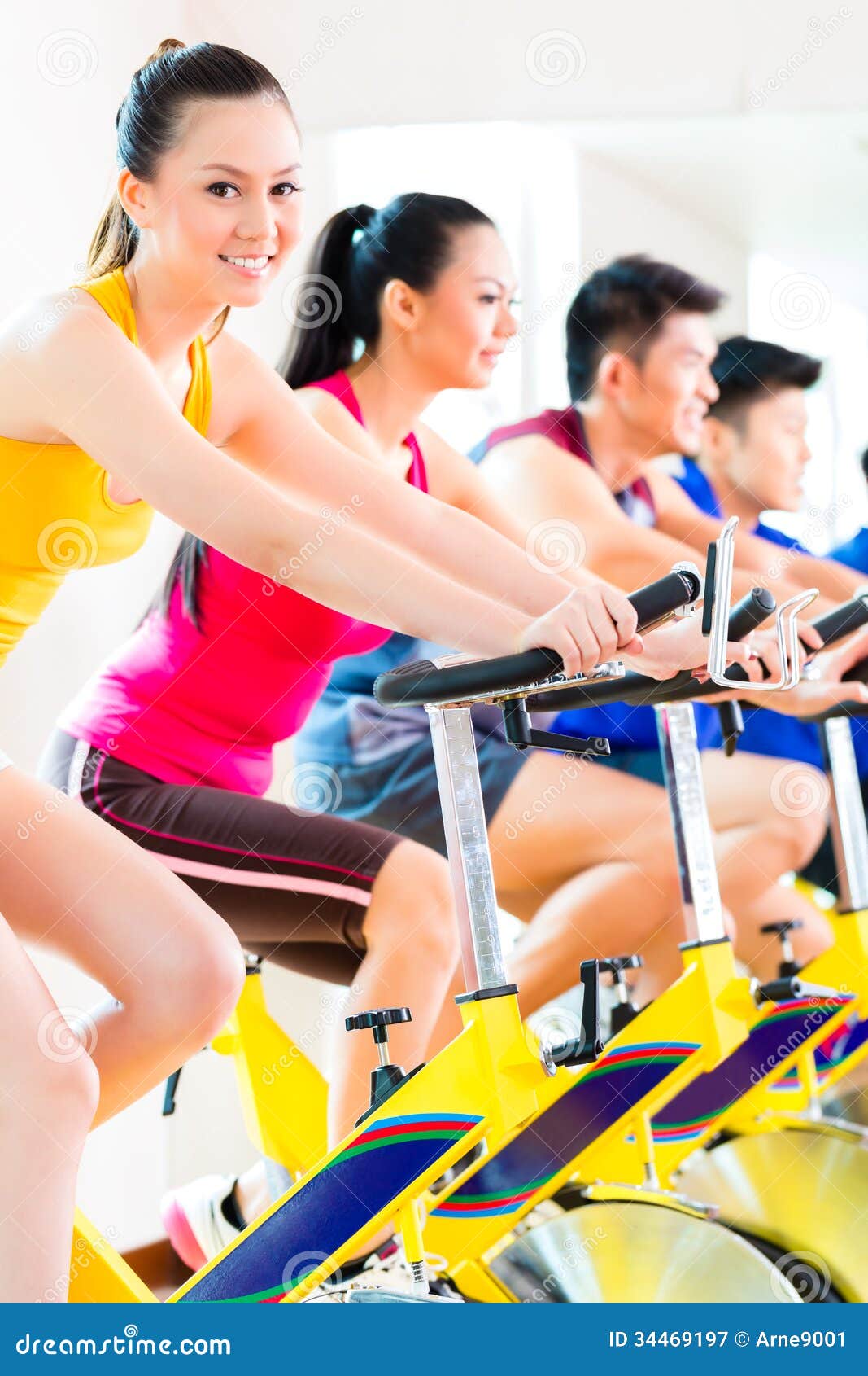 Asian People Spinning Bike Training At Fitness Gym Royalty 
