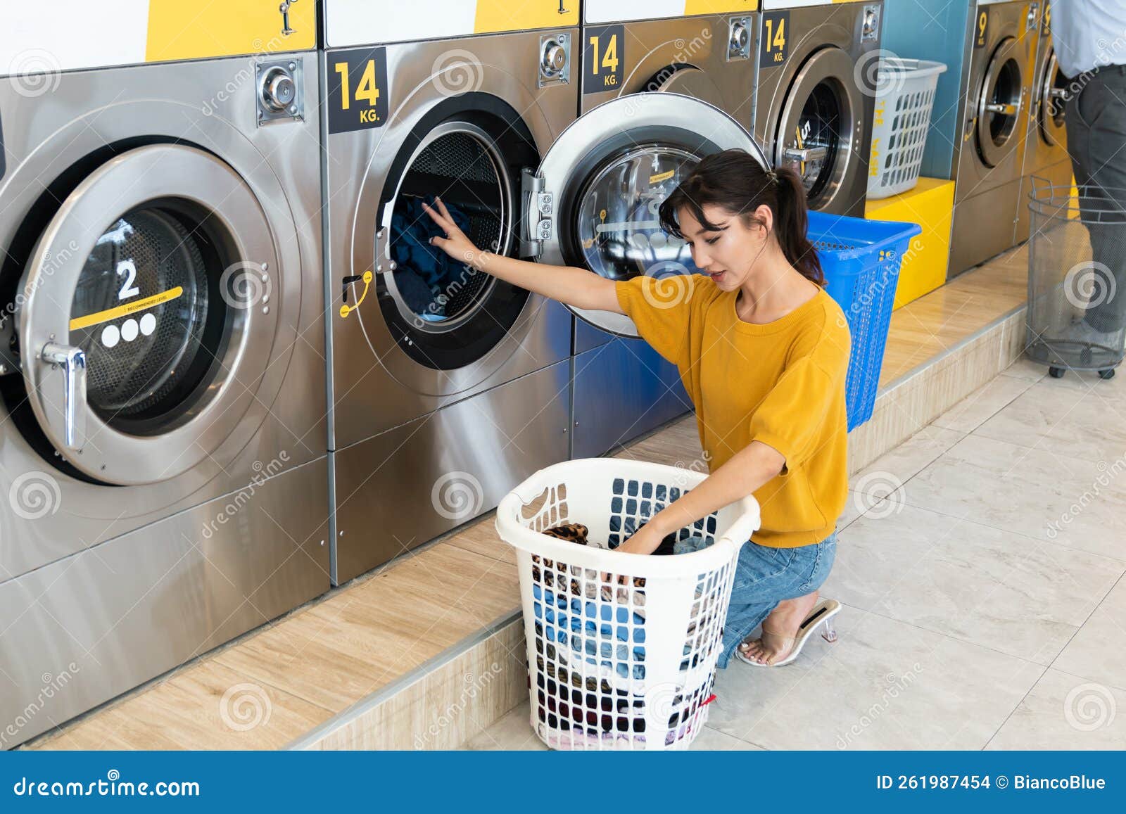 Asian People Using Qualified Laundry Machine in the Public Room. Stock ...