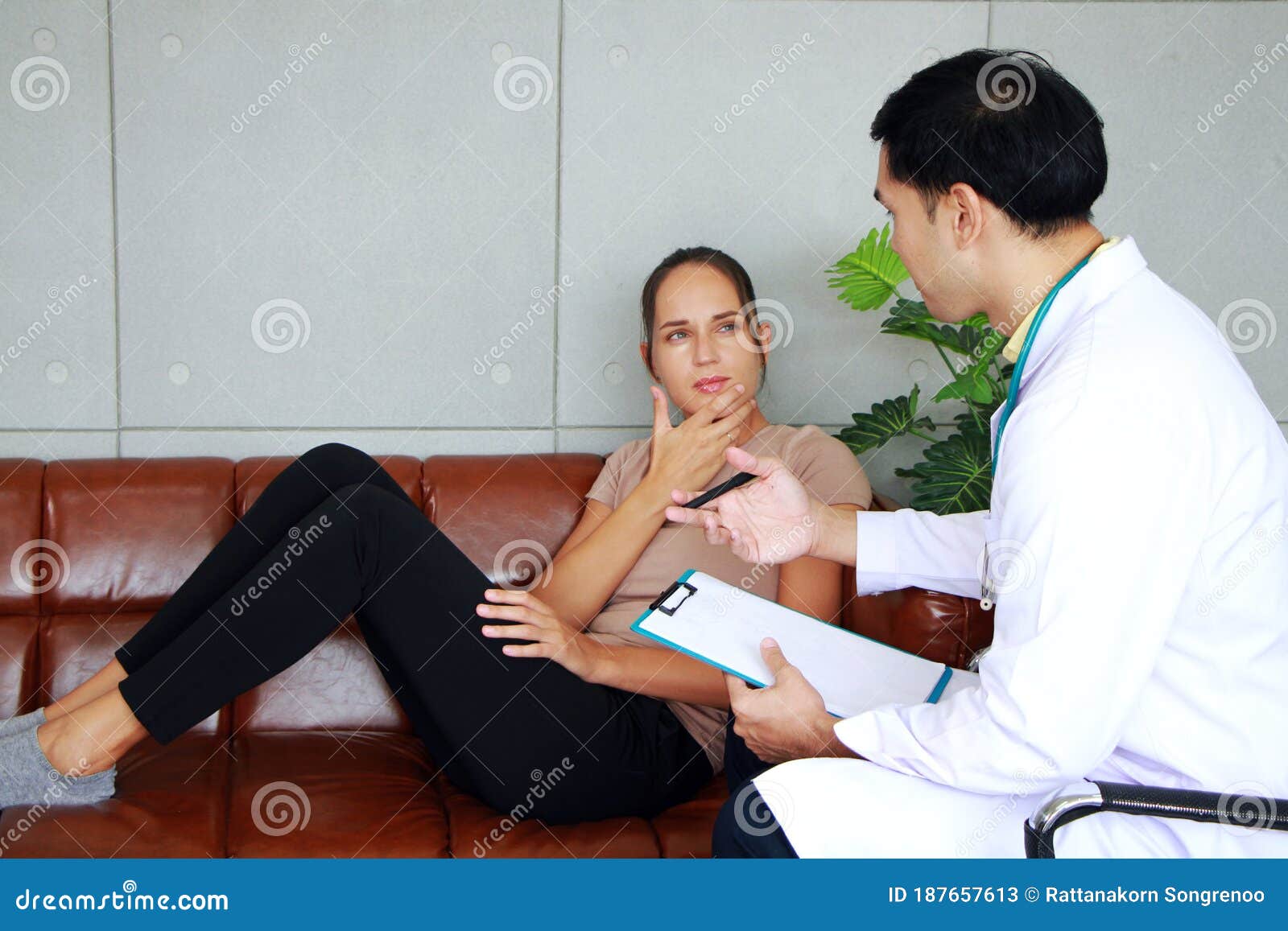 Asian Psychiatrist Md Man Is Counseling And Encouraging For Caucasian Woman Have Mental Health