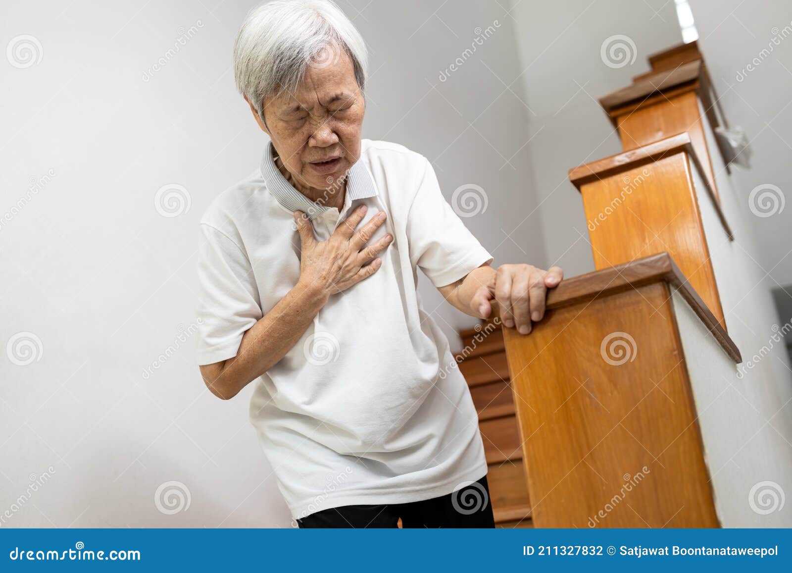asian senior grandmother suffering from pain in chest with acute dyspnea or asthma disease,tired old elderly eyes closed and hand