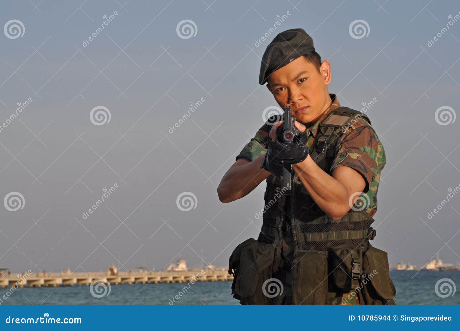 Asian Soldier Pointing the Rifle at Viewer Stock Photo Image of defense, korea 10785944