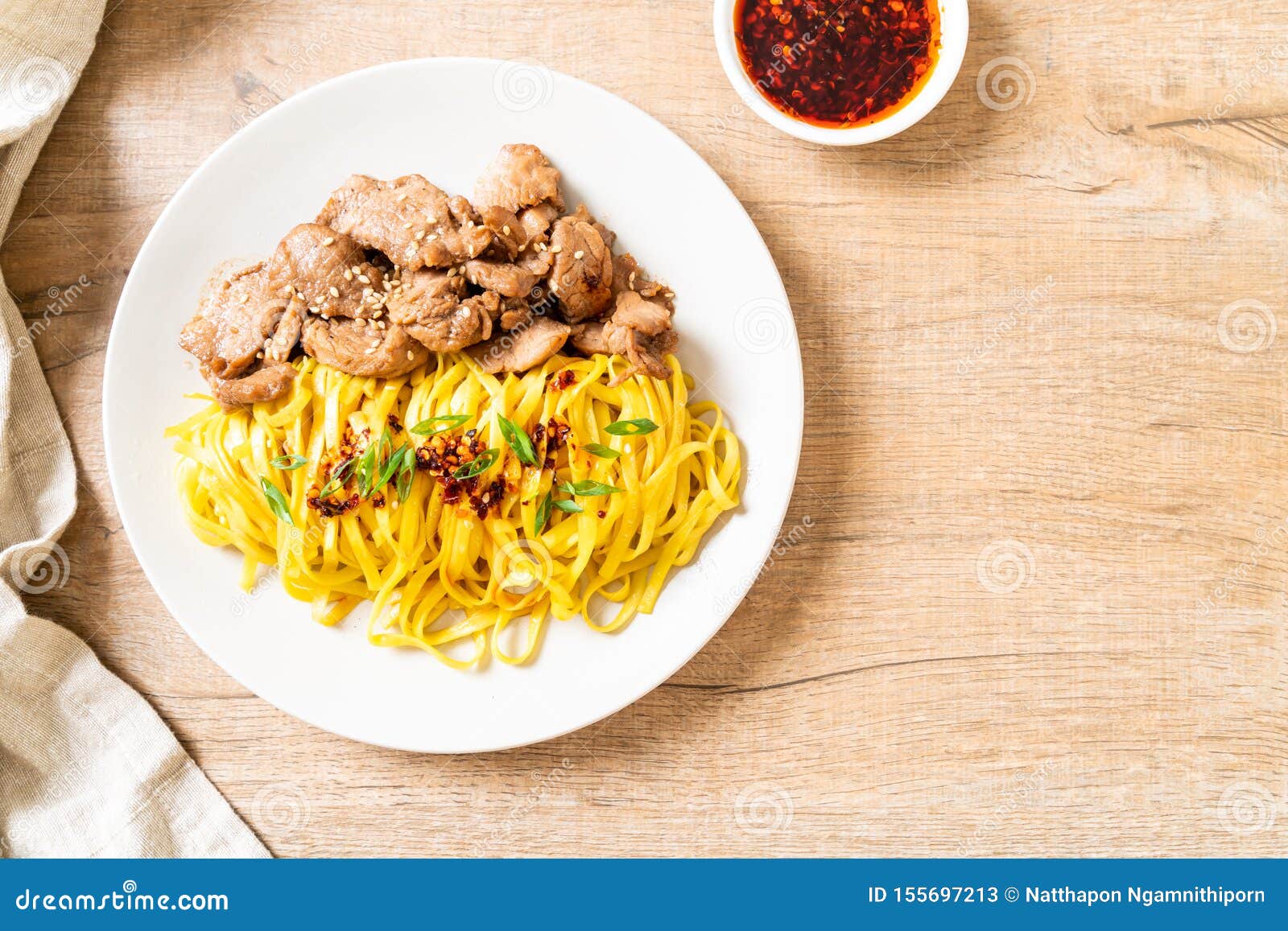 asian stir-fried noodle with pork and chili paste