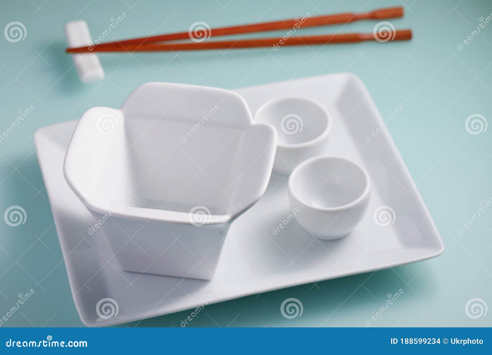 asian table setting on blue background