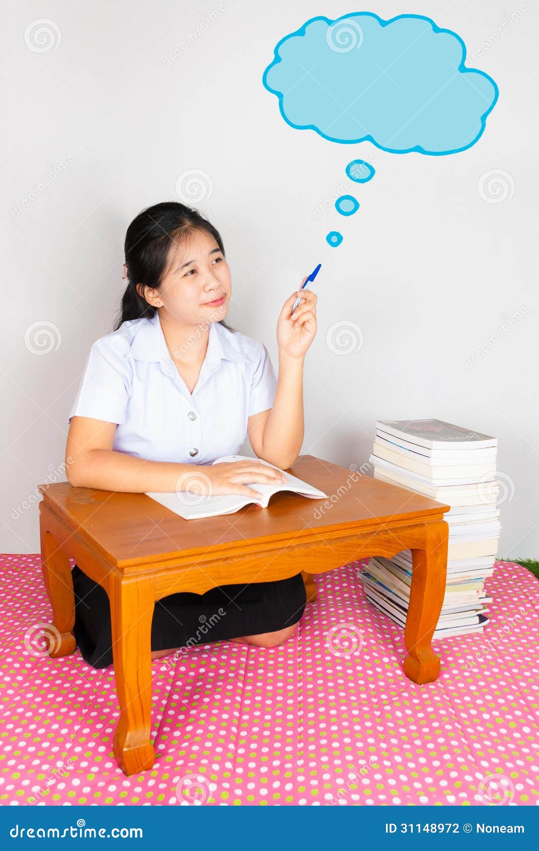 asian thai student points the cloud of idea