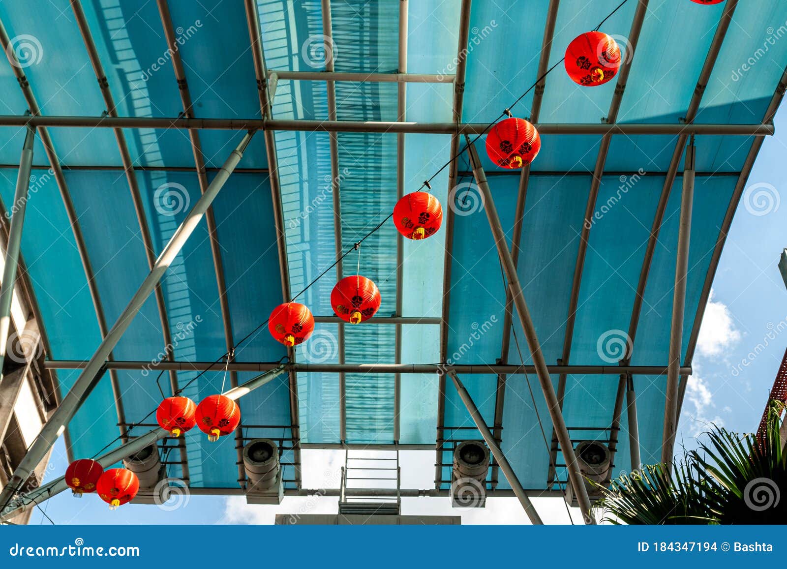 Asian Traditional Bright Red Lanterns Hanging at Street with Blue Glass  Roof on Background for Decoration during the Stock Photo - Image of  malaysia, fortune: 184347194