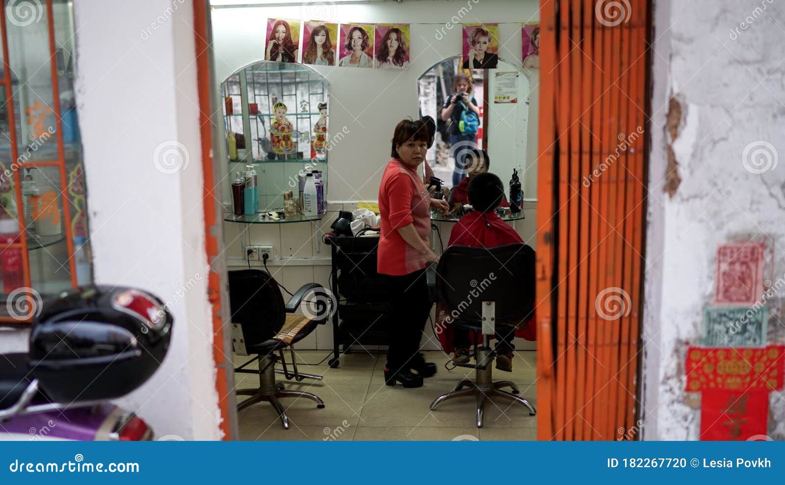 An Asian Woman Hairdresser is Cutting a Hair of a Young Child in a Beauty Salon in China Editorial Image - Image of china, beauty: 182267720 An Asian Woman Hairdresser is Cutting a Hair of a Young Child in a Beauty Salon in China Editorial Image - Image of china, beauty: 182267720