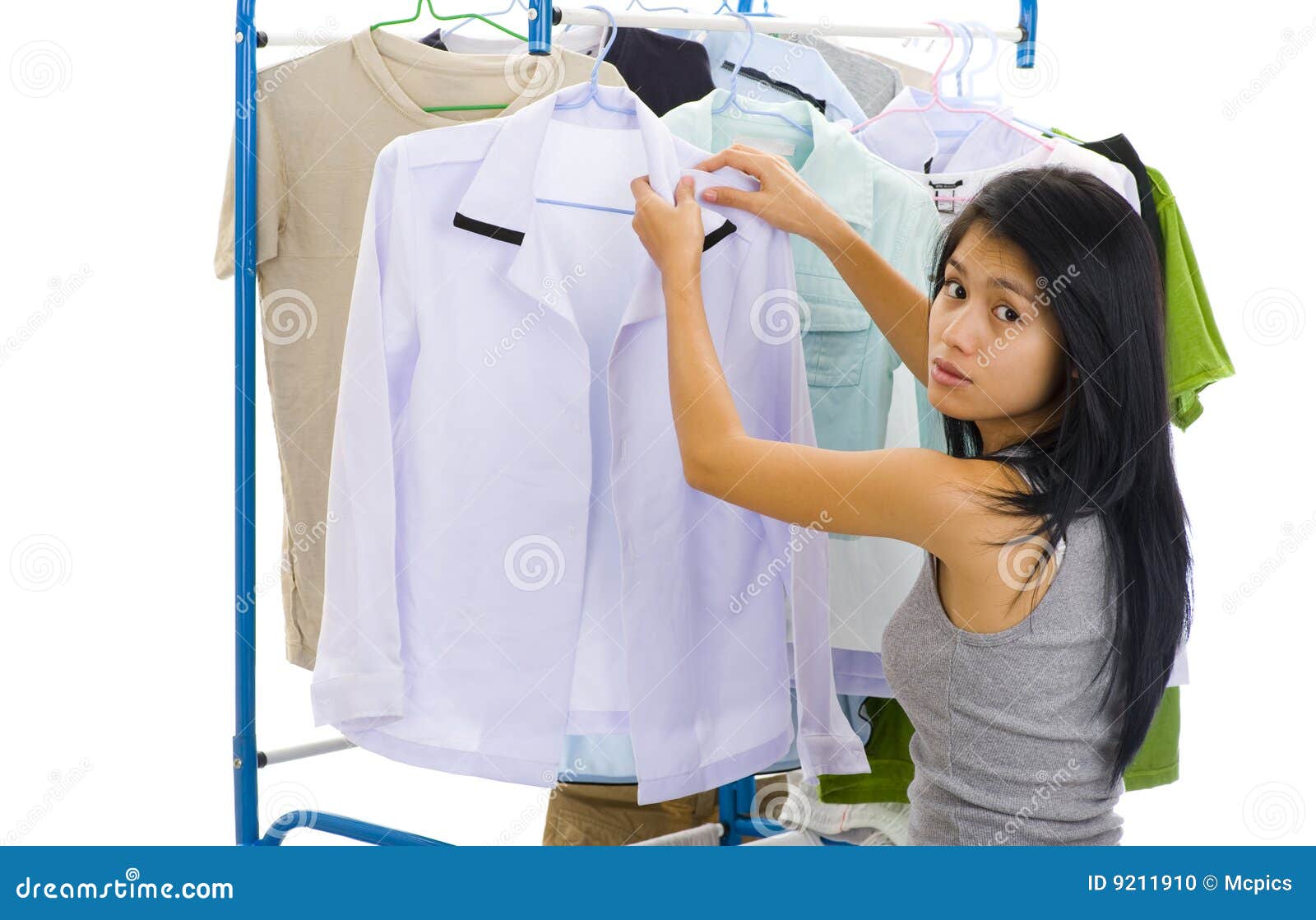 Asian Woman Hanging Clothes Stock Photo Image of isolated, indoor