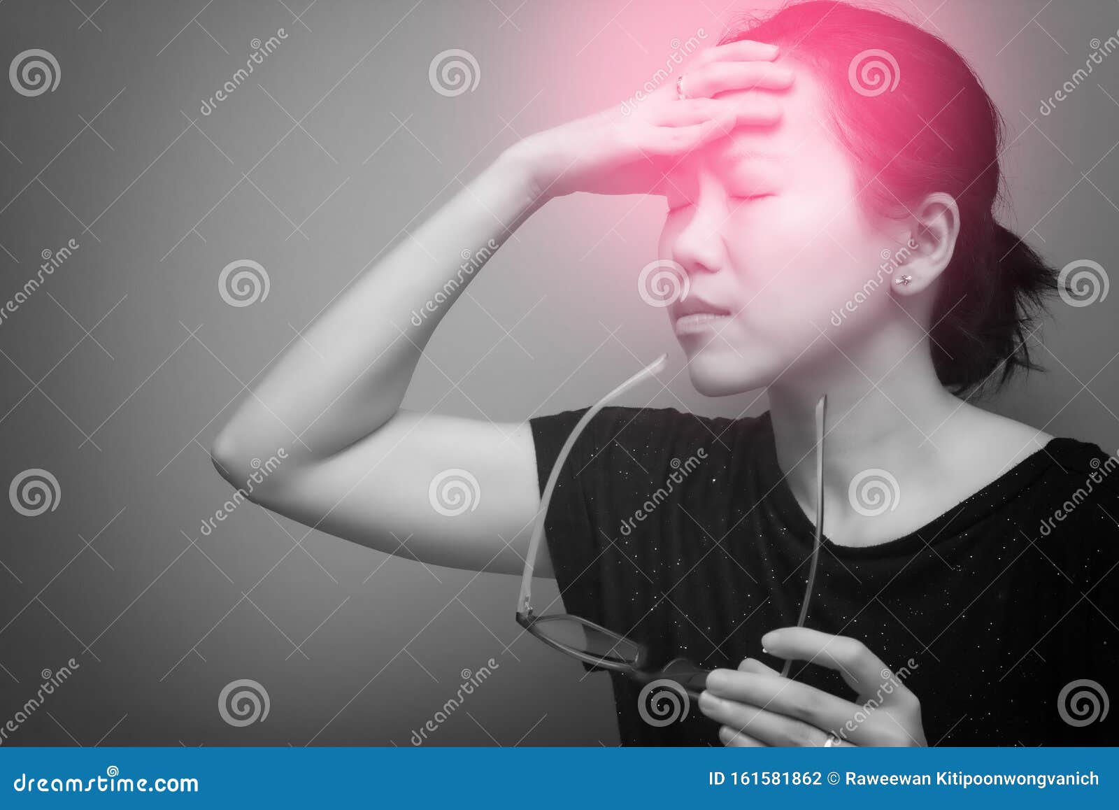 asian woman holding glasses, suffer from having a strong headache and fever, poor sight, farsightedness, myopia. black & white