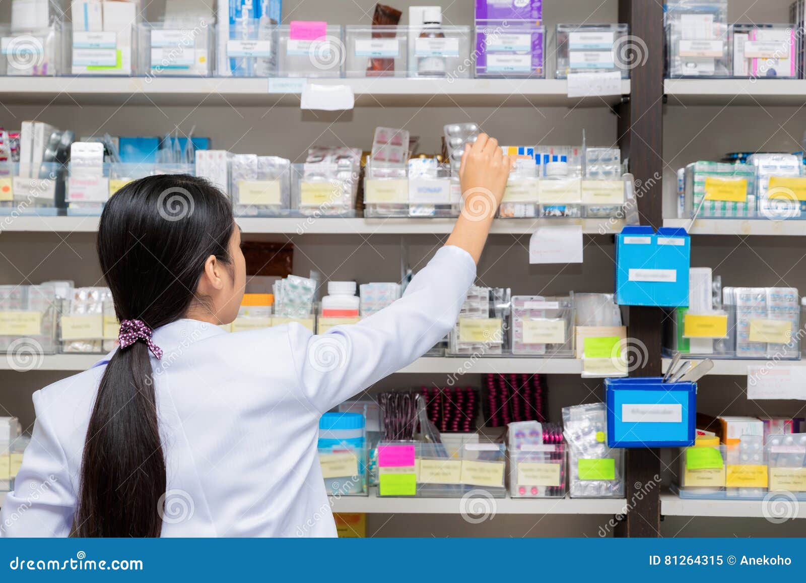 asian woman a pharmacist in pharmacy room