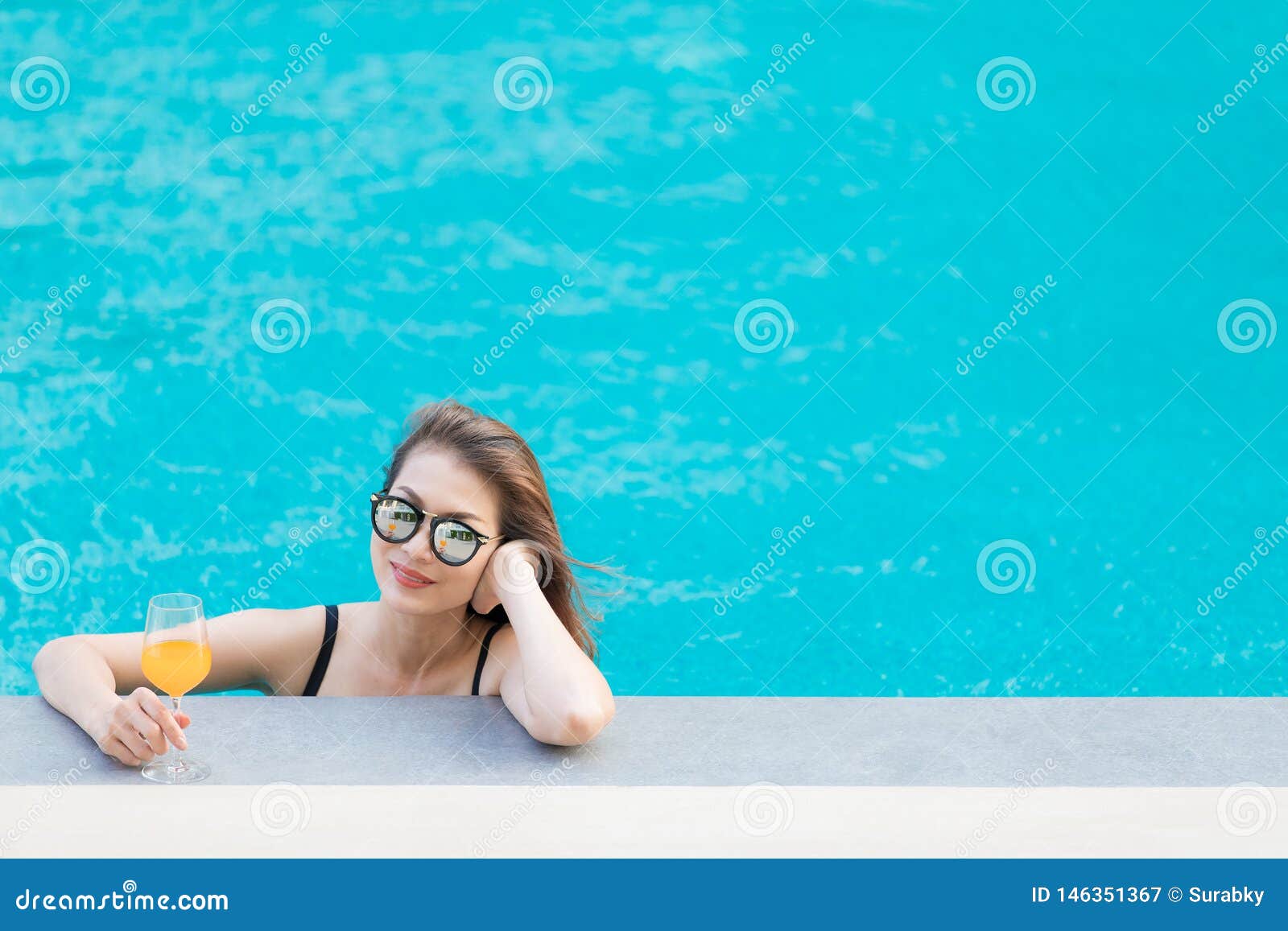 Asian Woman in Pool with Glass of Orange Juice Stock Image - Image of ...